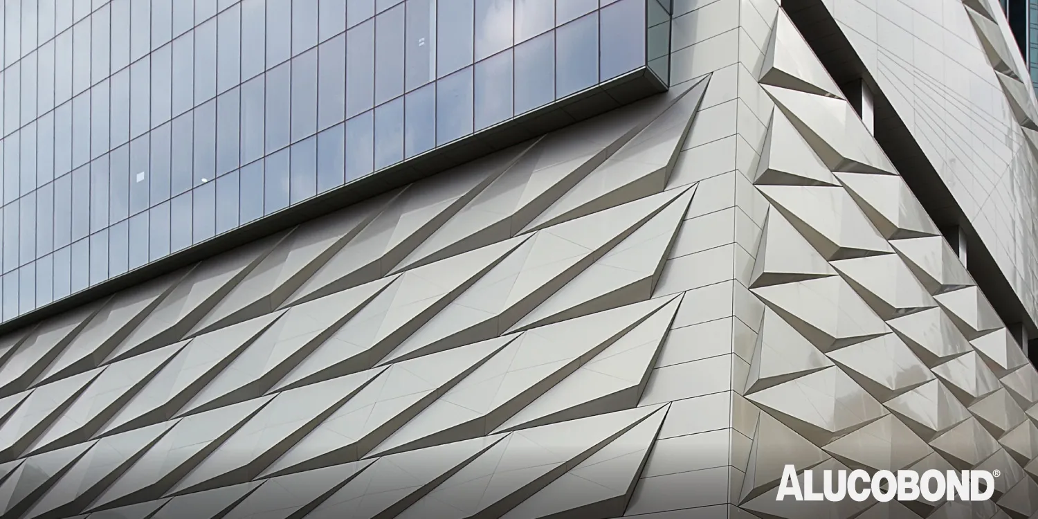 LOTTE Castle SKY L-65, Seoul – ALUCOBOND® PLUS Facade in Spectra Titanium and Anodized Look C0/EV1 LOTTE Castle SKY L-65 building in Seoul, South Korea featuring ALUCOBOND PLUS 4mm aluminium cladding in Spectra Titanium 902 and Anodized Look C0/EV1 finishes, designed by HaeAhn Architects and fabricated by LOTTE in 2023. A modern example of aluminium facade panels used in high-rise architecture.