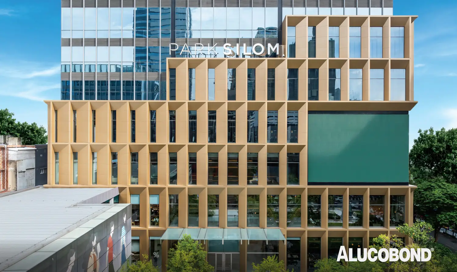 <strong>Project name</strong>: Park Silom | <strong>Location</strong>: Bangkok, Thailand | <strong>Product</strong>: ALUCOBOND® PLUS 4mm | <strong>Architect</strong>: HB Design Co., Ltd. | <strong>Fabricator/Installer</strong>: Clad & Craft Creation Co., Ltd. | <strong>Colour</strong>: Custom Colour – Suriyothai Fawn 9797 | <strong>Completed year</strong>: 2023