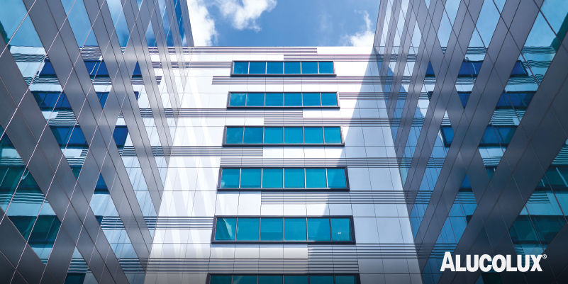 ESR Bizpark Curtain Wall Design Using Alucolux Sunrise Silver Aluminium Panels by Evergreen Engineering and TA.LE Architects,Stick vs Unitised Curtain Wall Comparison